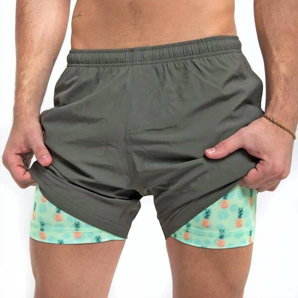 NEW BERMIES performance swim shorts in green (pineapple vibes liner)